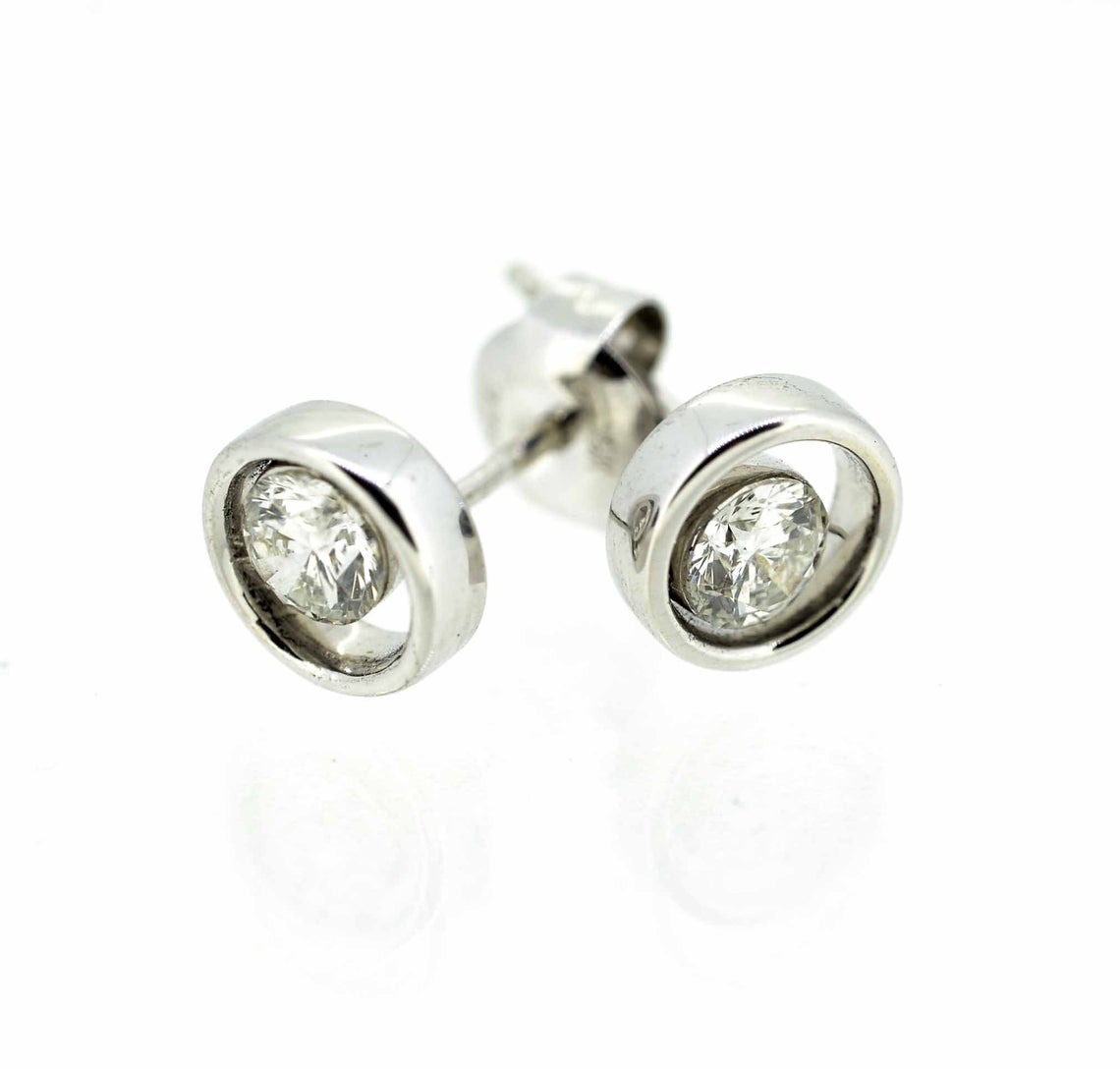 9ct White Gold Diamond Halo Stud Earrings