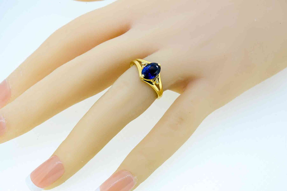 18ct Yellow Gold Sapphire And Diamond Dress Ring