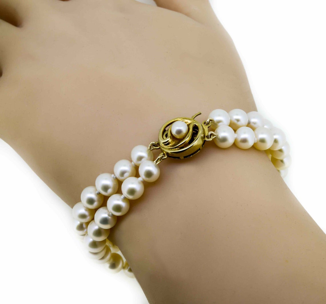 Two Strand Pearl Bracelet With Pearl Set Circular Clasp