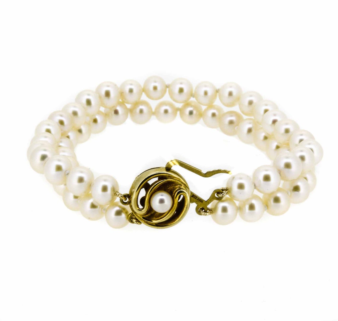 Two Strand Pearl Bracelet With Pearl Set Circular Clasp